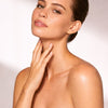 Inhibit Tensolift Neck Cream aplicado en piel - Natura Bissé